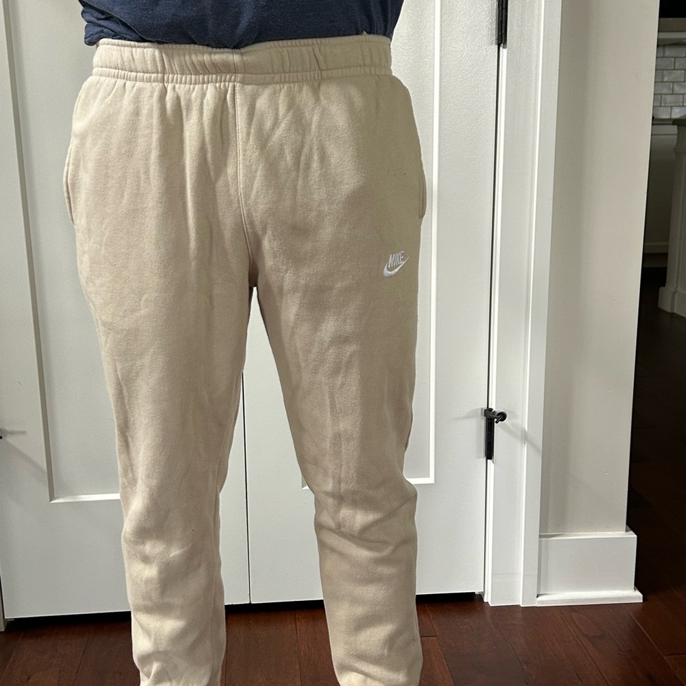 Nike Cream Joggers with Elastic Waistband and Tapered Ankles
